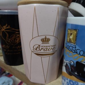 Brave Coffee/Tea Mug with a Silver Spoon